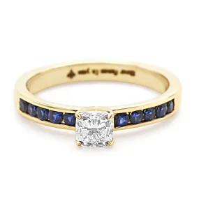 14ct Cushion Solitaire Diamond Ring with Sapphire Set Shoulders