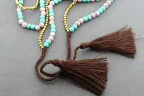 2 strand brass & turquoise tassle necklace