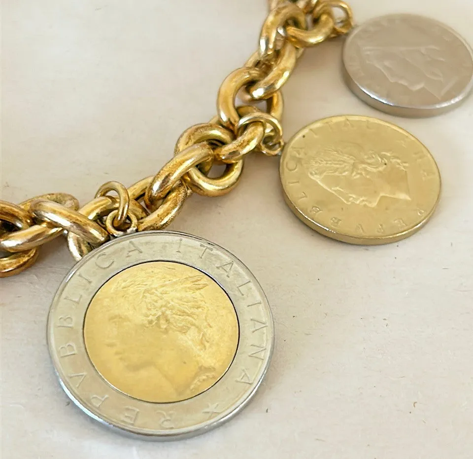 Amazing vintage Italian 18k gold over silver stamped Italian coin charm bracelet.