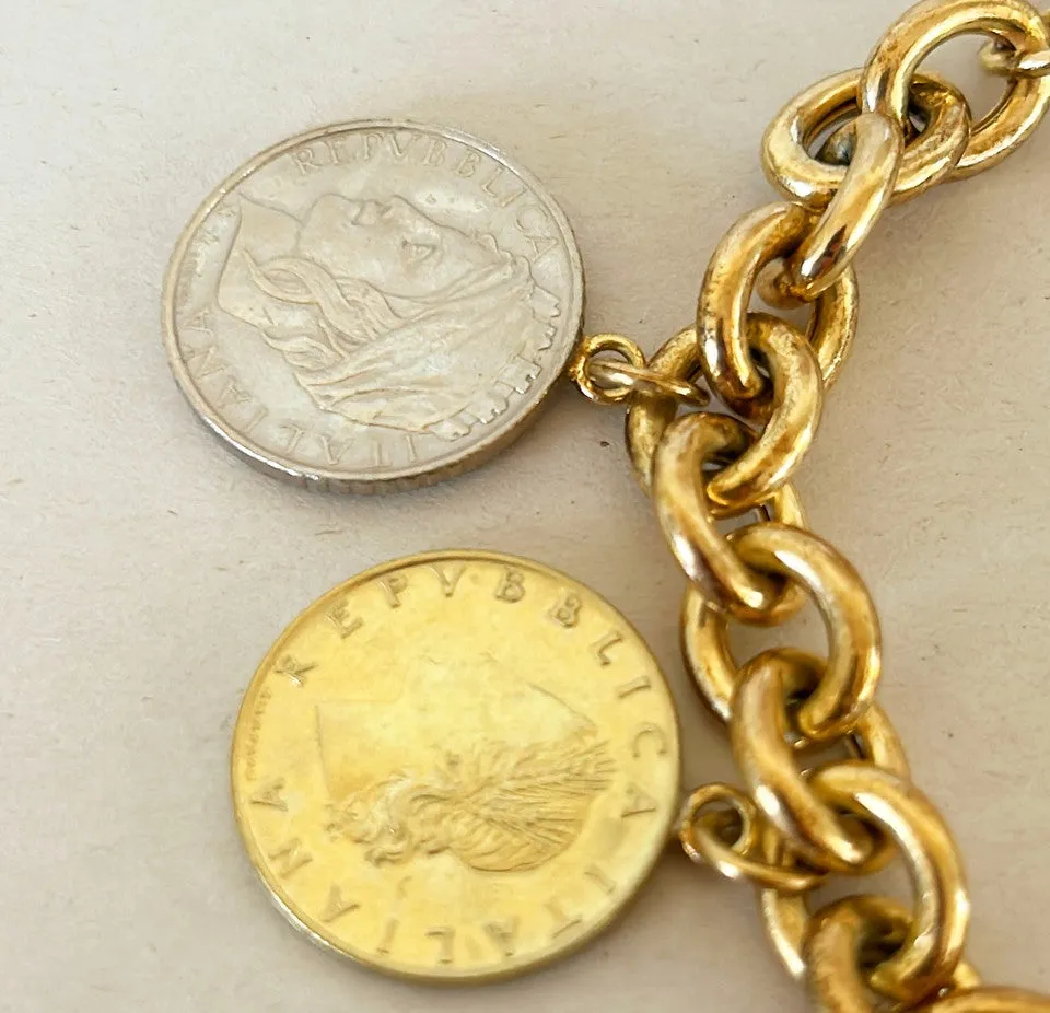 Amazing vintage Italian 18k gold over silver stamped Italian coin charm bracelet.