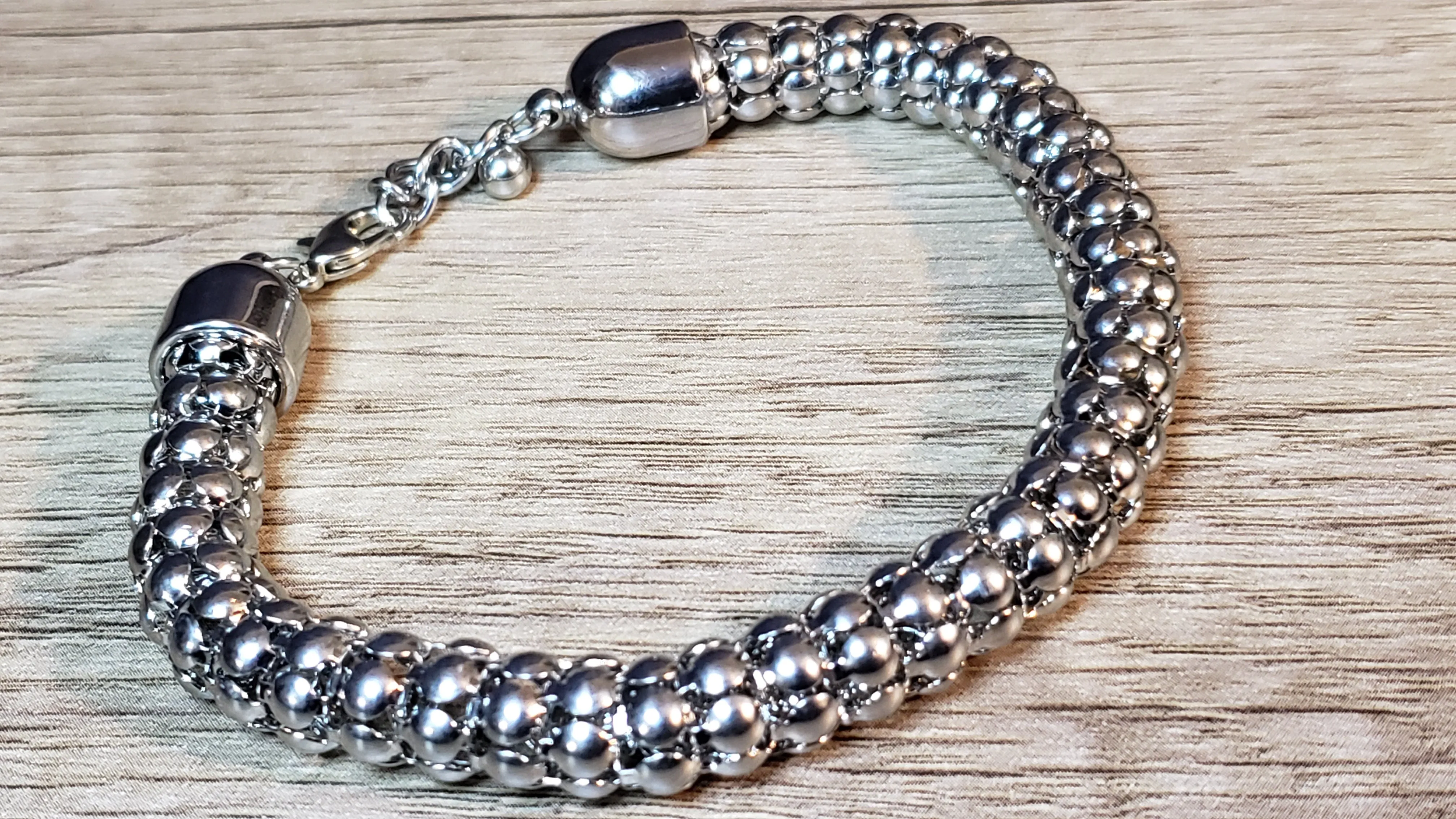 Extra Large Unisex Stainless Steel Bracelet Adjustable up to 11" with Lobster Claw Clasp.
 
 