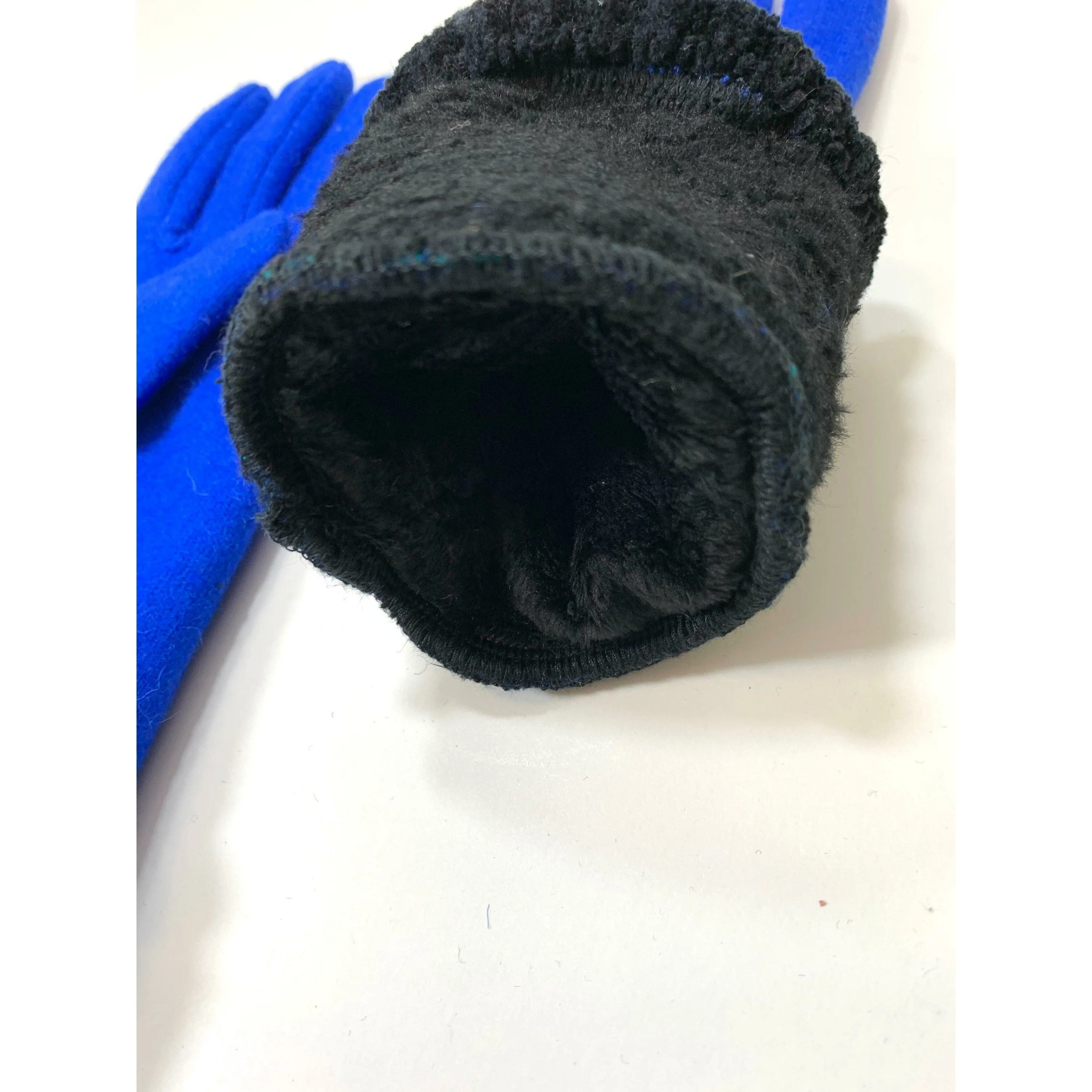 Fully lined blue wool gloves in soft stretch wool and recycled sweater cuffs. Free shipping.