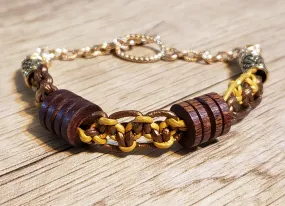 Genuine Leather Bracelet with Wood Beads & Non Tarnish Gold Tone Chain, 7.5" with Toggle Clasp.
 