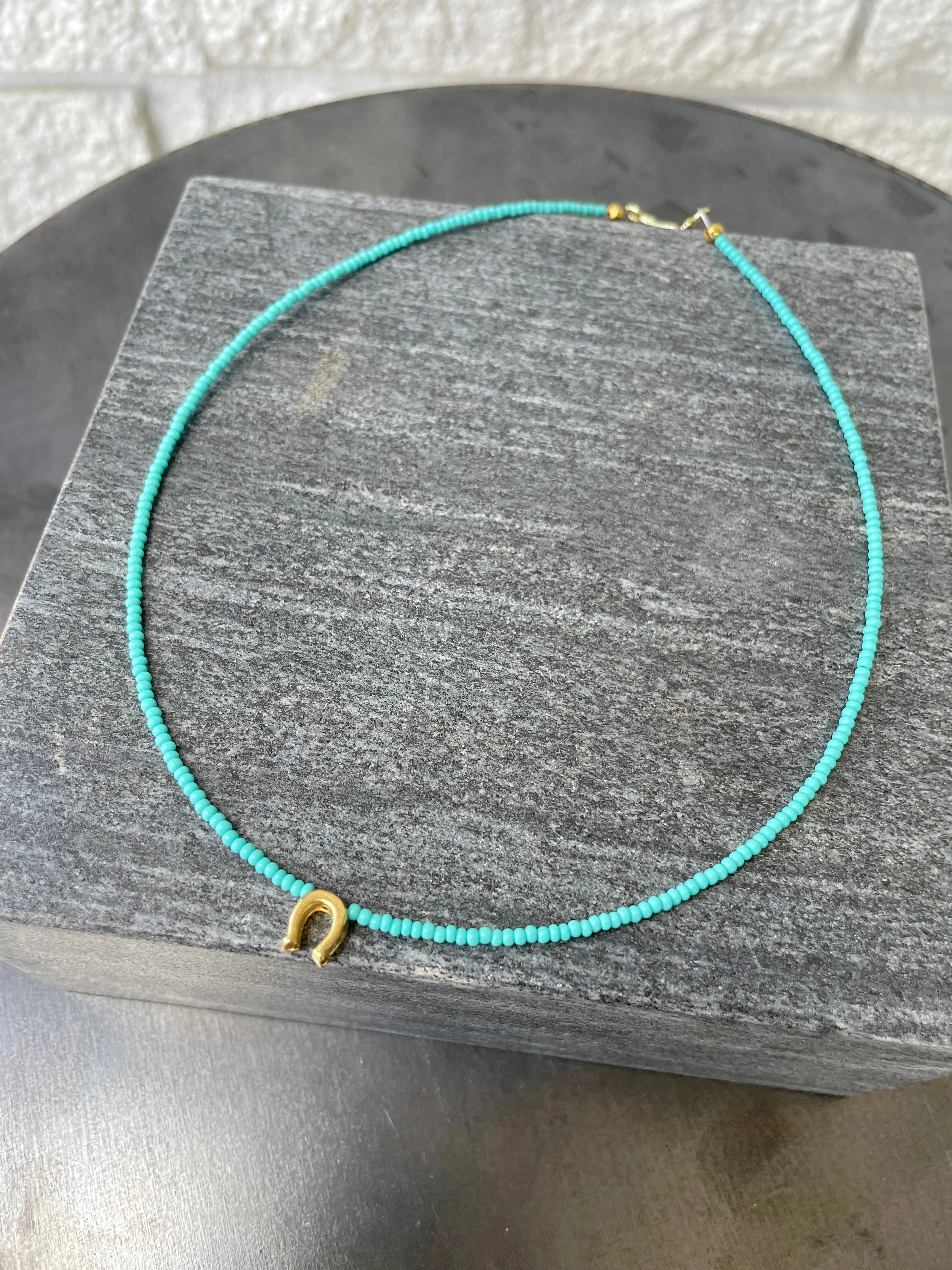 Gold Horseshoe Necklace in Turquoise