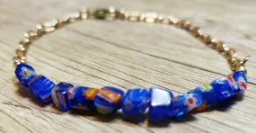 Hand Crafted, Painted Blue Millefiori Glass & Gold Tone Chain Bracelet. Adjustable to 8.5" with Lobster Claw Clasp