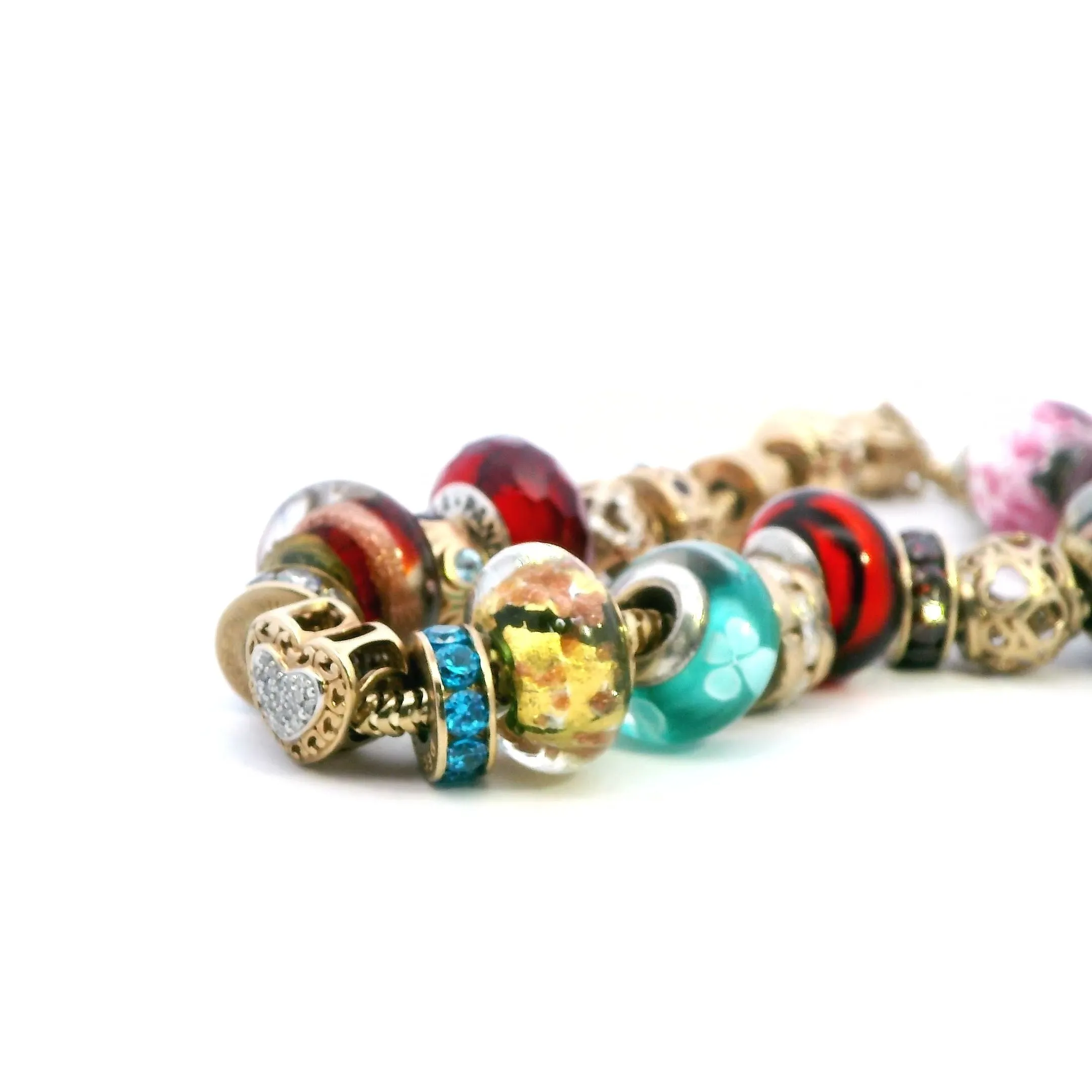 Luxurious 10k Yellow Gold Charm Bracelet with Exclusive Charms