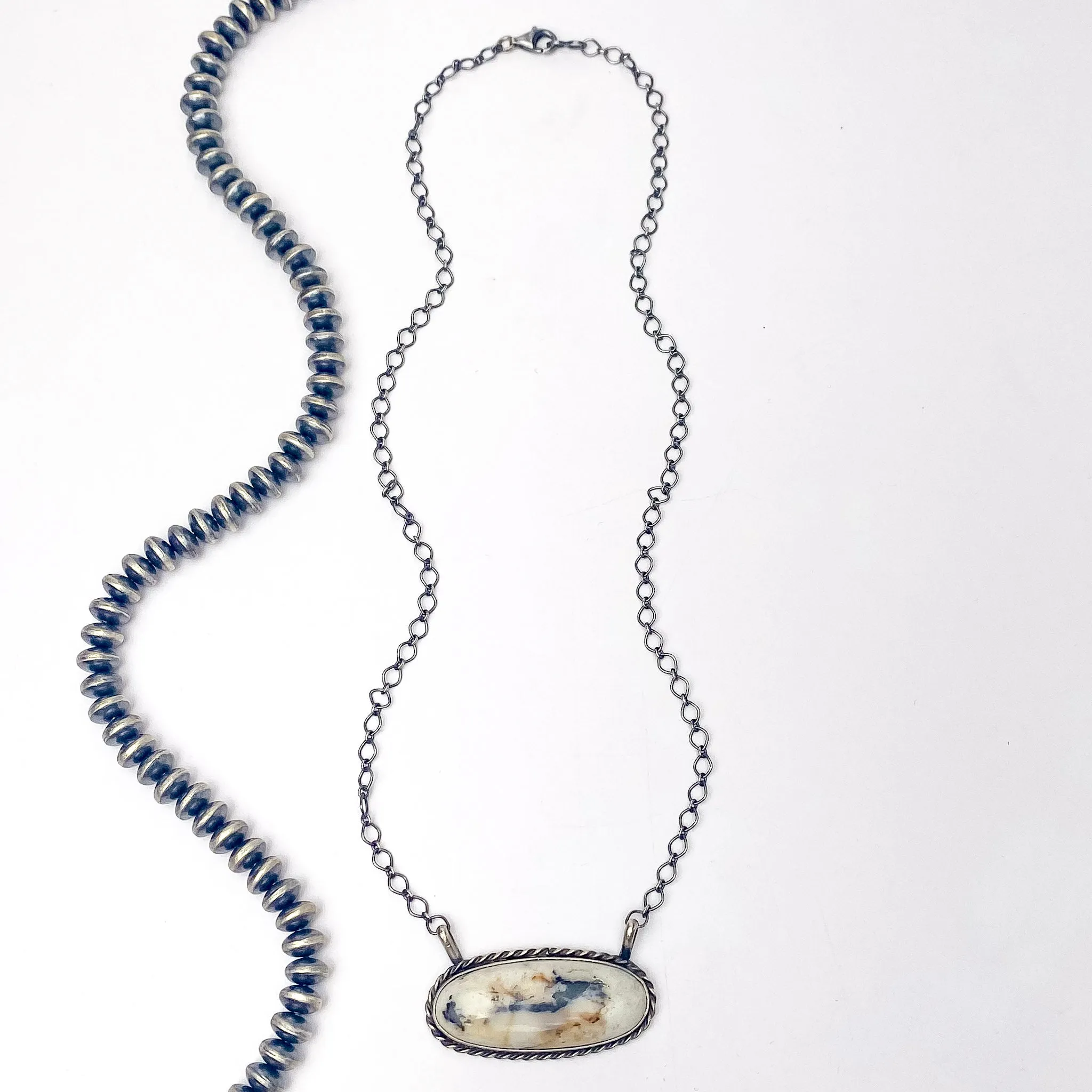 Navajo | Handmade Navajo Sterling Silver Oval Bar Shaped Necklace in White Buffalo