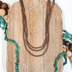 Three Strands of Long Faux Navajo Pearls in Copper Tone